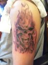 burning skull tattoo