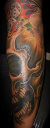 skull tattoo on leg