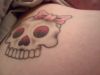 skull tat on  back
