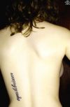 text tats on back of girl