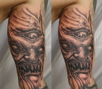 Demon Face Tattoos On Leg
