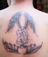 angel and demon tattoo on back