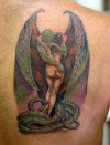 demon and girl tattoo on right shoulder back