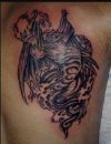 demon images tattoo on arm