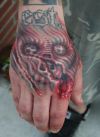 demon tattoos on hand