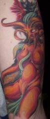 girl demon leg tattoo