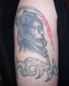 grim reaper and armband tattoo