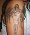 vampire and fallen angel tattoo on arm