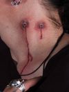 vampire bite tattoos on neck