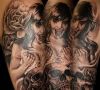 vampire girl and skulls tattoo on full sleeve