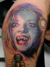vampire girl tattoo on knee
