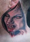 vampire girl tattoo on neck