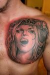 vampire girl tattoos on chest