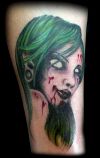 Tattoo of Zombie Face on Leg