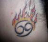 burning cancer zodiac sign tattoo