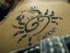 cancer zodiac sign tattoo on stomach
