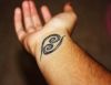 cancer zodiac wrist tattoo