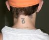 capricorn neck tattoo for guy