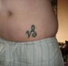 capricorn sign tattoo on stomach