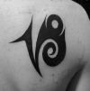 capricorn tribal tattoo on back