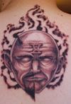devil face and gemini sign tattoo