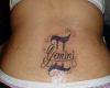gemini tattoos on back