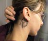 leo tattoo on back of ear