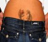 pisces pic tattoo on lower back