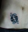 pisces pic tattoo on stomach