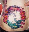 pisces pics tattoo on stomach