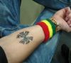 zodiac pisces arm tattoo