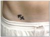 sagittarius pic tattoos on lower stomach