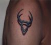 taurus symbol tattoo on arm