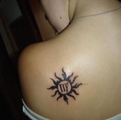 Tribal Sun And Virgo Sign Tattoo