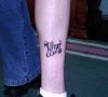 zodiac virgo text tattoo on leg