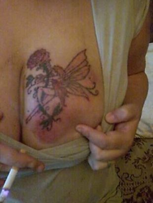 Fairy Tattoo With Flower
