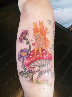 Fairy On Mushroom Tattoos