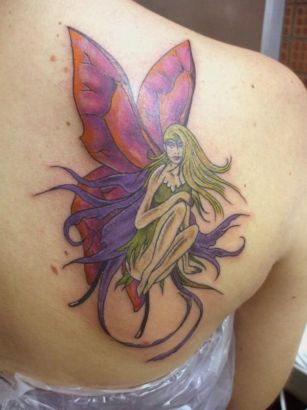 Fairy Tattoos On Girl's Back