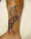 unicorn tattoos on leg