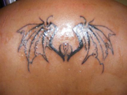 Bat Wing And Heart Tattoo