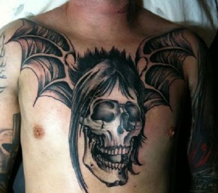 Skull Bat Tattoo On Chest 