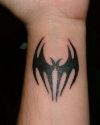 bat pic tattoo on wrist