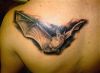 flying bat tattoo on left shoulder blade 