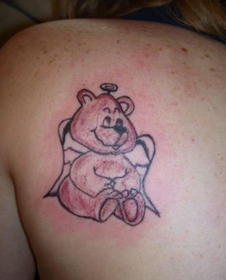 Bear Tattoo On Left Shoulder Blade