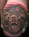 bear tattoo on knee