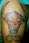 bull head tats on arm