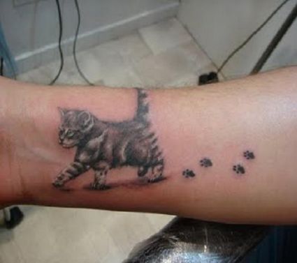 Cat And Paw Tattoo On Arm