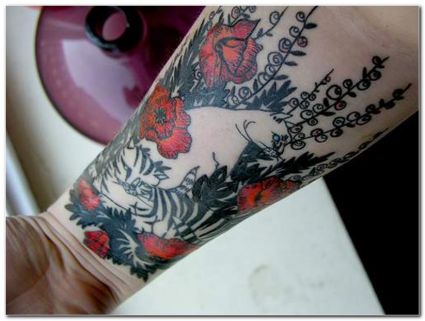 Cat And Flower Tattoo On Arm