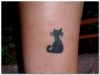 small black cat tattoo