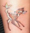 cartoon deer and butterfly tattoo